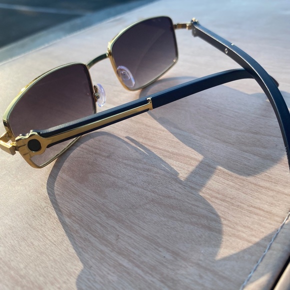 Black on Gold Cartier replicas - Picture 1 of 3